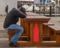 Man sitting on a bench and resting