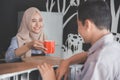 Man sitting in a cafe bar served with coffee Royalty Free Stock Photo