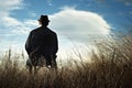 A man sitting on a chair in the countryside