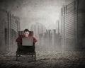 Man sitting on the chair typing with laptop Royalty Free Stock Photo