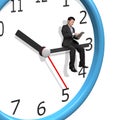 Man sitting on clock hands Royalty Free Stock Photo