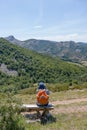 Man sitting contemplating the Palencia mountain Royalty Free Stock Photo