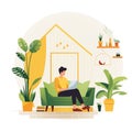 man sitting on couch with laptop surrounded by plants