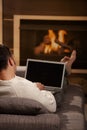 Man sitting at fireplace Royalty Free Stock Photo