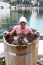 Man sitting in font in winter