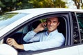 A man sitting in his car and talking on the phone Royalty Free Stock Photo