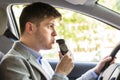 Man Sitting Inside Car Taking Alcohol Test Royalty Free Stock Photo