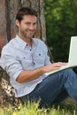 Man sitting with laptop Royalty Free Stock Photo