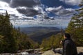 Man sitting and looking out from elevation on Mount Washinton vi Royalty Free Stock Photo