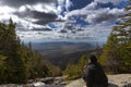 Man sitting and looking out from elevation on Mount Washinton vi Royalty Free Stock Photo