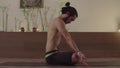 Man sitting in lotus pose and doing kriya yoga