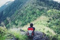 Man sitting on mountain adventure travel concept Royalty Free Stock Photo