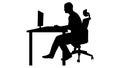 Man Sitting on An Office Chair and working on a computer with office table desk Royalty Free Stock Photo