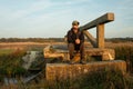 A man sitting on an old bridge Royalty Free Stock Photo