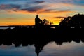 Man sitting overlooking sunset over lake Vattern Royalty Free Stock Photo