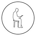 Man sitting reading Silhouette concept learing document icon black color illustration in circle round