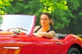 Man sitting in a red car Royalty Free Stock Photo