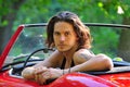 Man sitting in a red car Royalty Free Stock Photo