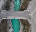 Man sitting on the edge of Napoleon bridge over river Soca. Kobarid, Slovenia. Royalty Free Stock Photo