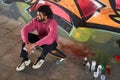 Man sitting on the skateboard Royalty Free Stock Photo