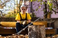 Man sitting on the sofa after cleaning in the yard