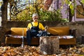 Man sitting on the sofa after cleaning in the yard Royalty Free Stock Photo