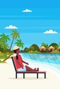 Man sitting sun bed lounge chair on tropical island villa bungalow hotel beach seaside green palms landscape summer