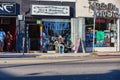 Man sitting at tattoo parlor on Melrose avenue