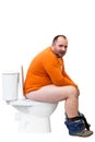 Man sitting on toilet Royalty Free Stock Photo