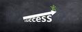 Man sitting on top of Success Arrow