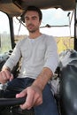 Man sitting in tractor Royalty Free Stock Photo