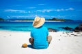 Man sitting on the tropical island beach Royalty Free Stock Photo
