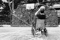 Man sitting on wheel chair with broken leg in Plaster cast , try