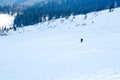 Man ski free ride downhill at winter season in shadow on beautiful sunny day Royalty Free Stock Photo