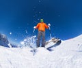 Man with ski mask skiing in action view from below Royalty Free Stock Photo