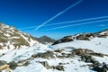 Man on a ski tour next to glacier lakes with scenic view on Hoher Sonnblick in High Tauern mountains in Carinthia, Salzburg,