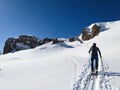 A man on a ski tour towards Erdisgulmen in the Flumserberg. Ski climbing in beautiful Switzerland. High quality photo