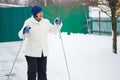 Man skier riding by snowy piste. dilettante, dabbler, layman.