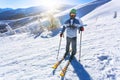 Man skier on a slope in the mountains