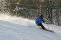 A man skiing down ski slope Royalty Free Stock Photo