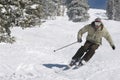 Man Skiing Down Snow Covered Slope Royalty Free Stock Photo