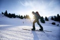 Man skiing uphill in high snowy mountains