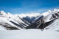 Man skins up the track toward the Asulkan Glacier and the Seven Steps to Paradise backcountry ski run. Behind him is the Trans-