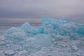 A man with a sledge is walking among the blue ice hummocks of La Royalty Free Stock Photo