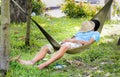 man sleep in a hammock