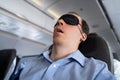 Man With Sleep Mask On Airplane Royalty Free Stock Photo