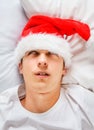 Man sleep in Santa Hat