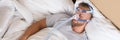 Man With Sleeping Apnea And CPAP Machine Royalty Free Stock Photo