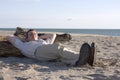 Man sleeping on beach Royalty Free Stock Photo