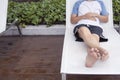 Man sleeping on beach chair. Royalty Free Stock Photo